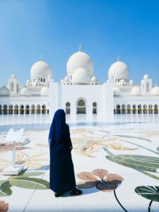 woman looking at Sheikh Zayed Grand Mosque