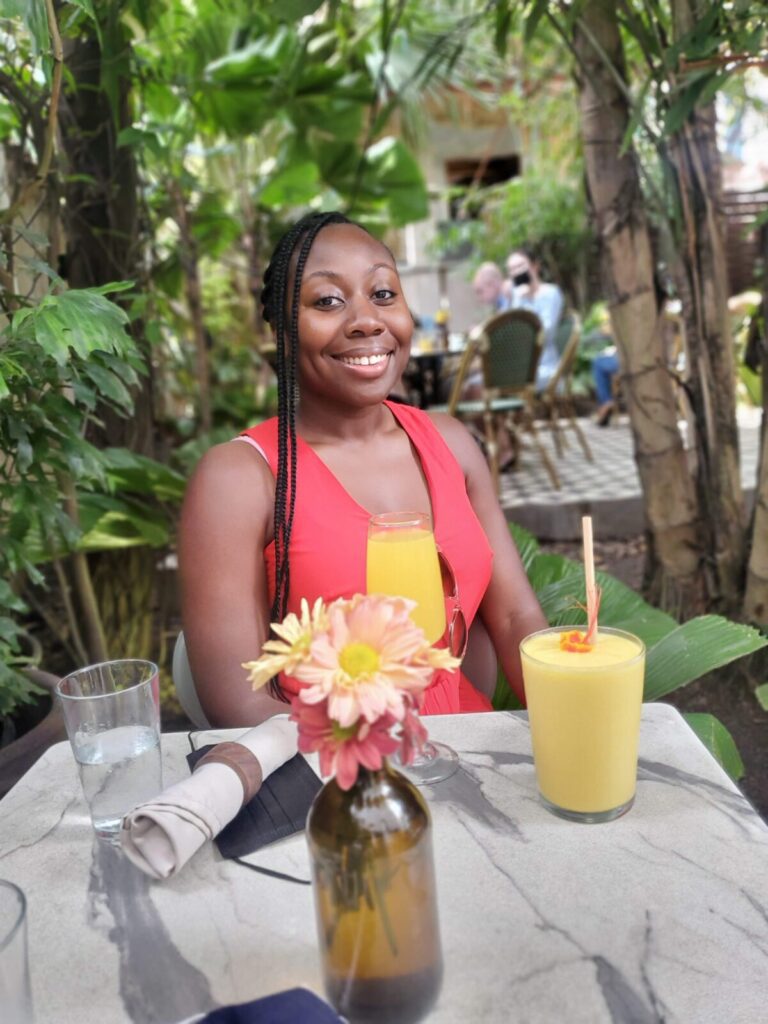 woman sitting outside at restaurant