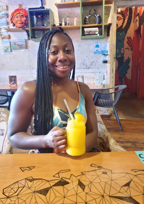 woman in restaurant with drink