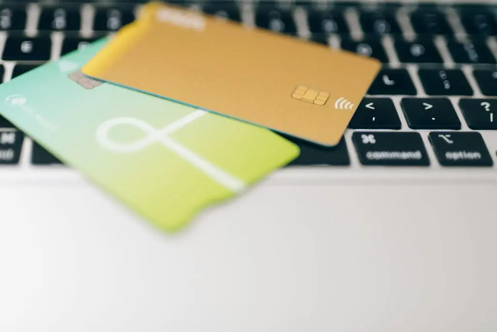 Close-Up Shot of Credit Cards on Laptop Keyboard
