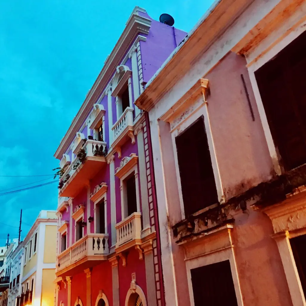 Vibrant colonial buildings at dusk in Old San Juan, Puerto Rico.